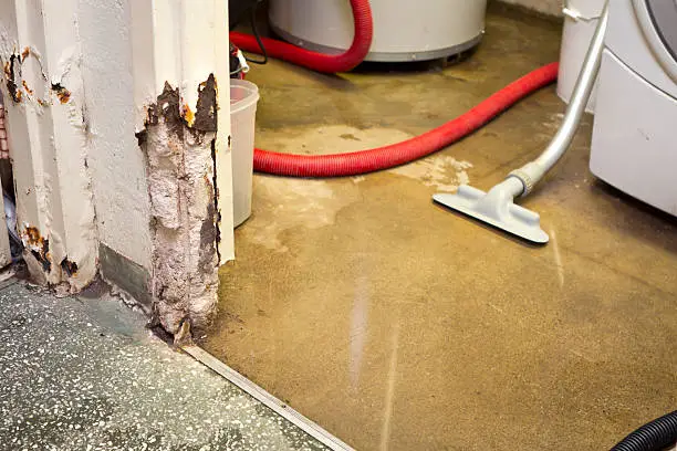 Flooded basement cleanup and water extraction in Denver